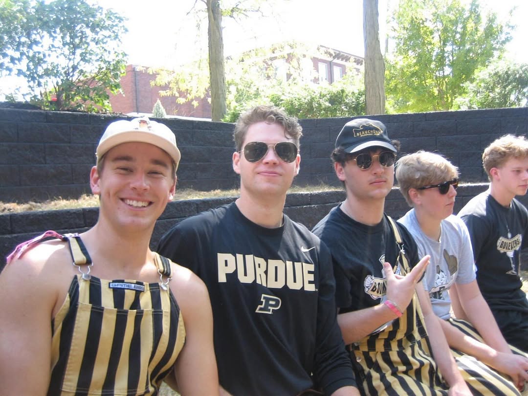 Brothers in Purdue gameday overalls