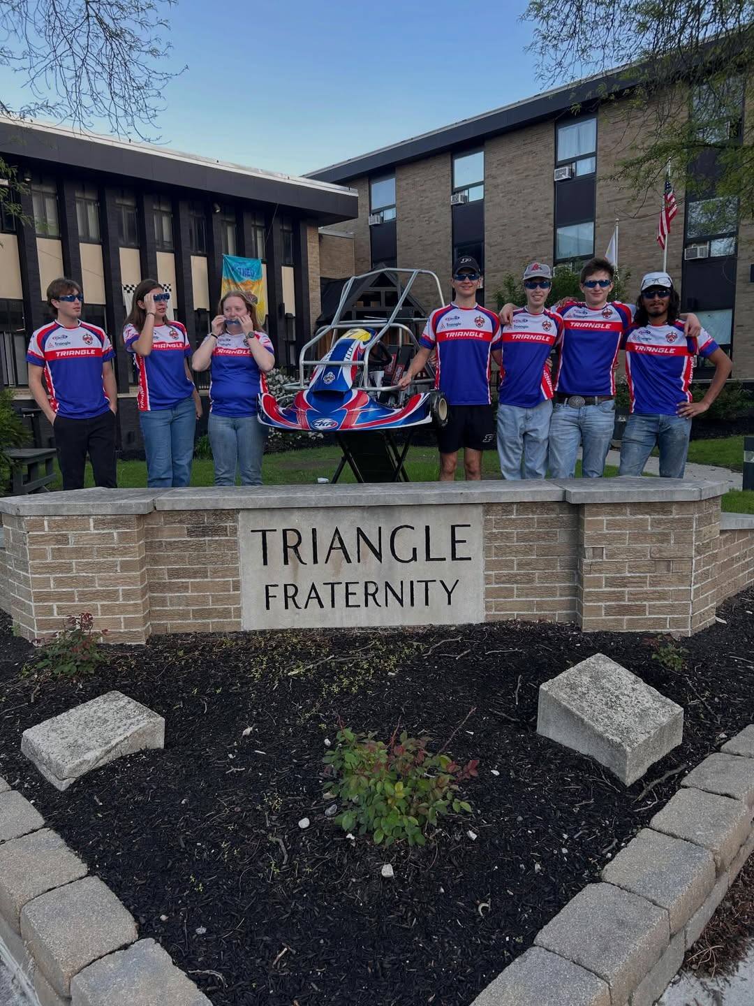 The Triangle Grand Prix team with their kart