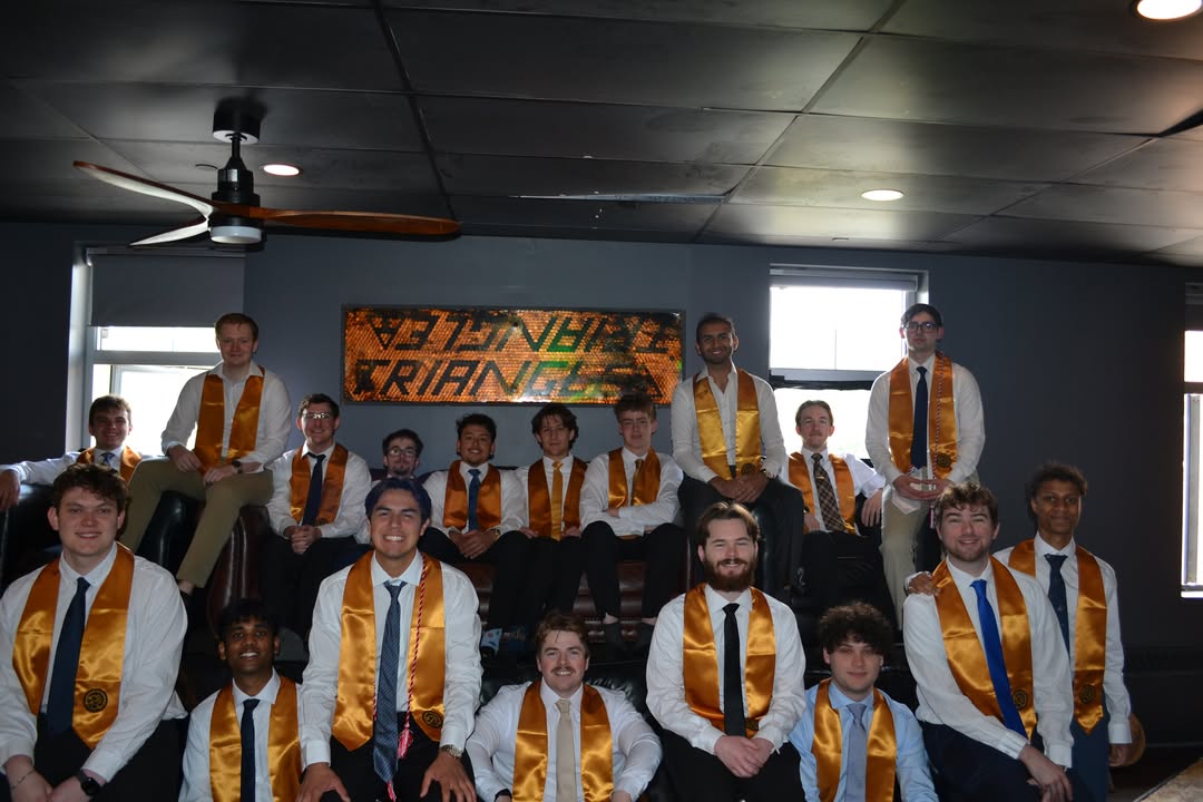 Brothers hanging out together on the couches in the chapter house